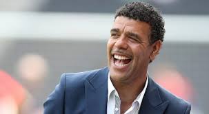 Unveiling the Charismatic Charm of Chris Kamara: A Football Legend